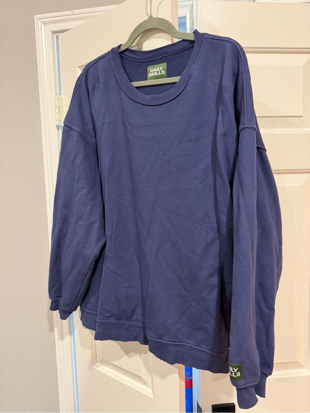 Daily Drills Navy Sweatshirt with Green Logo Patch